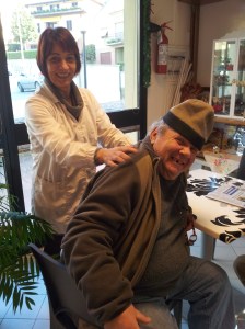 Alessandro enjoying Laura's shoulder massage. Photo J Finnigan