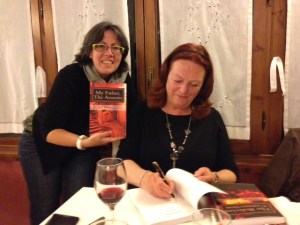 Me signing Valerie's books Photo Jackie