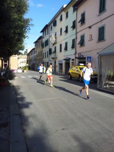 Runners outside Bar Solferino in Certaldo. Phot J Finnigan