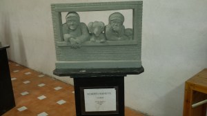 Couple, dog and cat at window. Photo P Finnigan